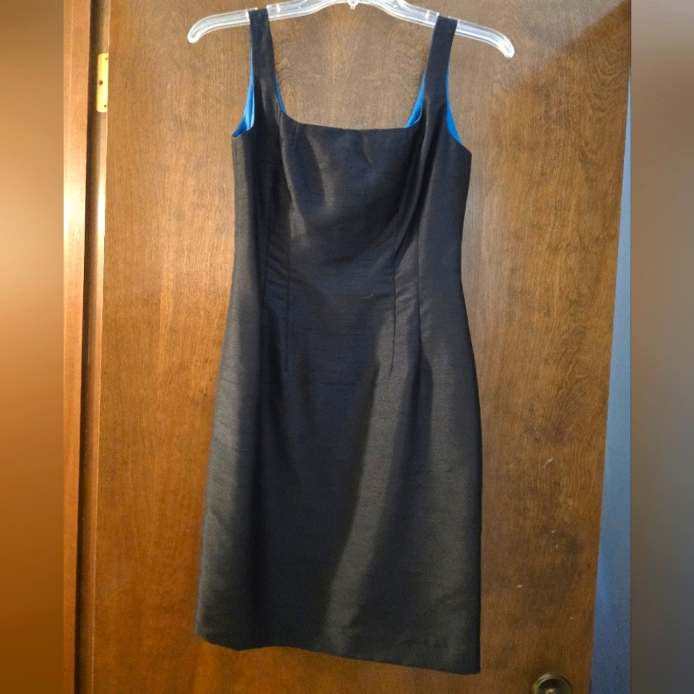 Like new Petite Donna Ricco black sheath dress.
